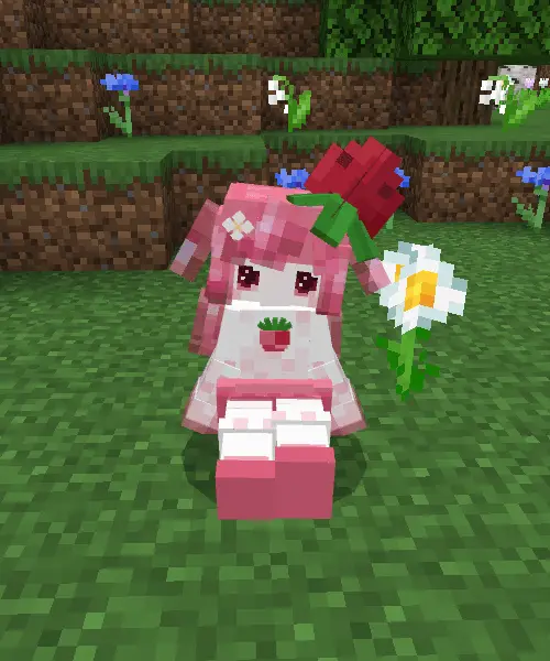 Cute pink companion sitting on grass.
