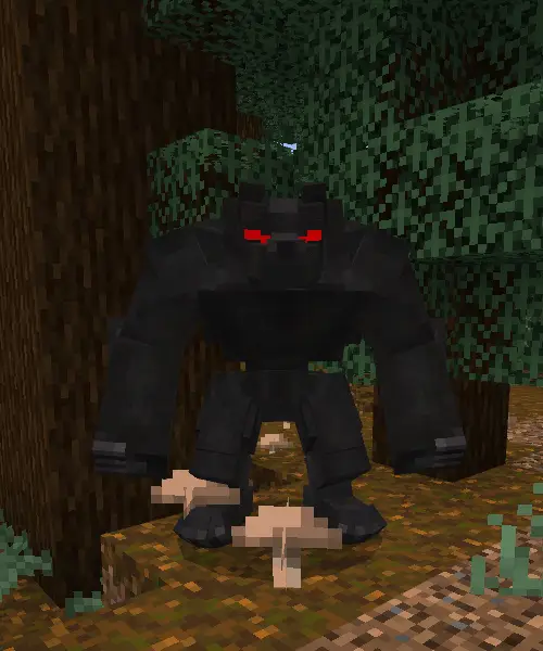 Blocky black creature with glowing red eyes