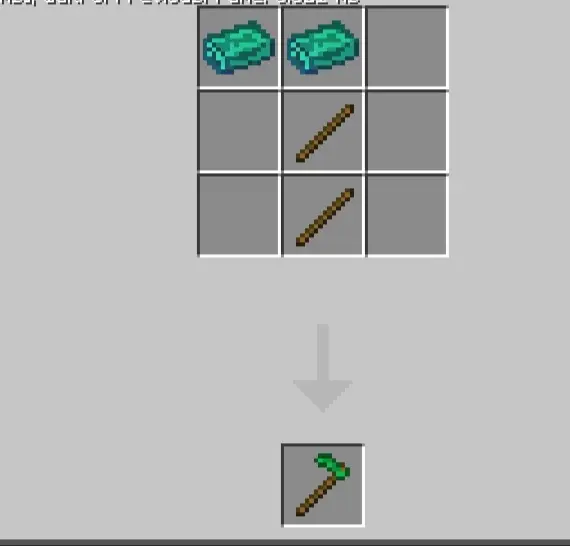 Crafting recipe for an emerald pickaxe