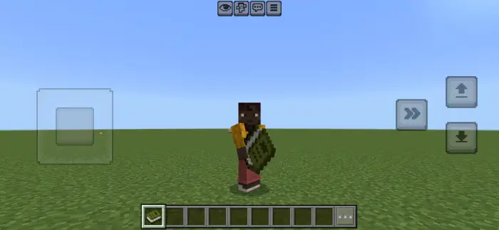 Player holding book on grassy plain