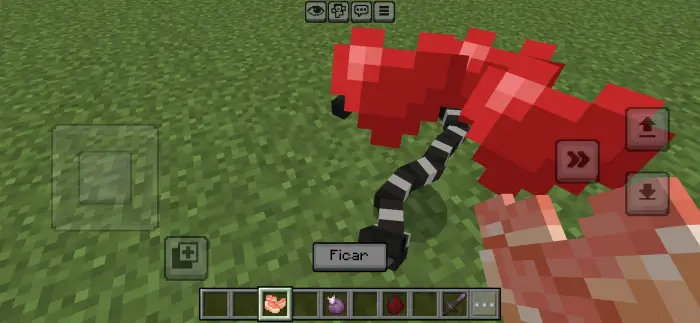 Red pixelated creature on grass with menu.