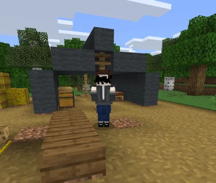 Player companion stands by a custom shelter.