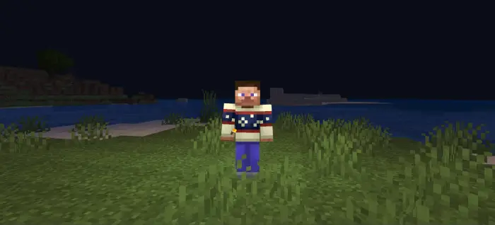 Player holding a glowing item at night