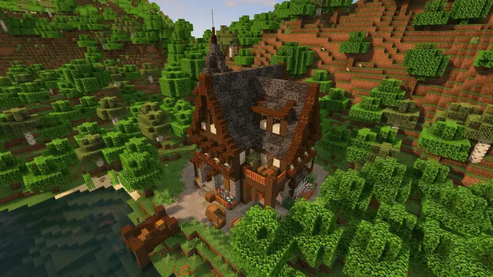 Germanic-style timber house by a forest lake