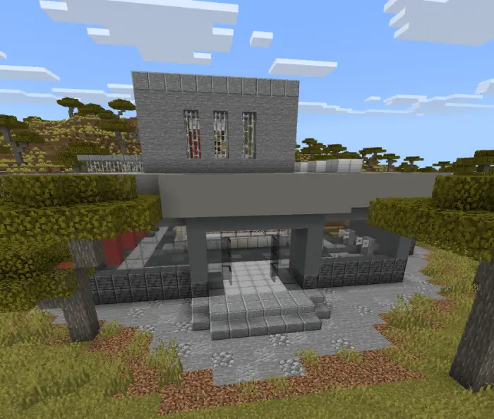 Modern stone companion structure in savanna.