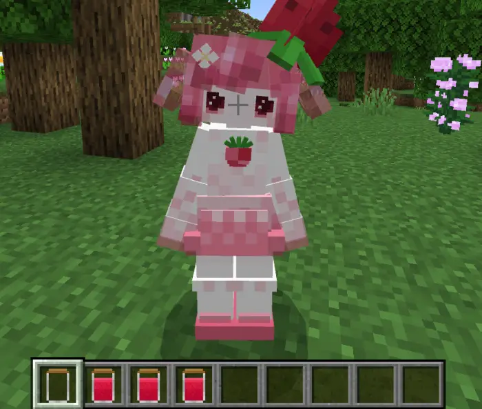 Pink strawberry-themed companion character.