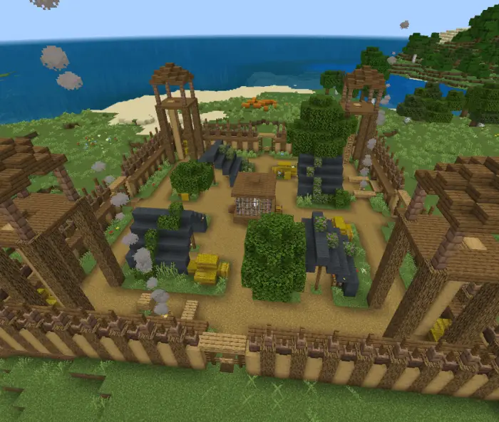 Wooden fort with towers and tents inside