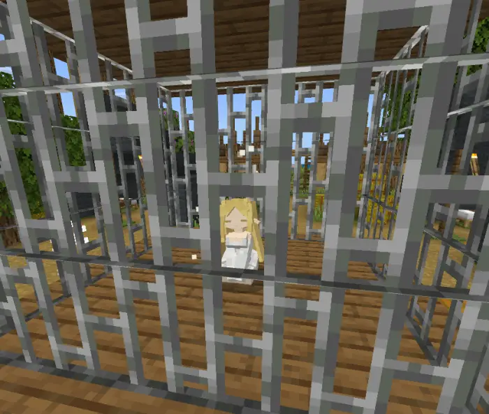 Companion character inside an iron cage.