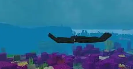 Bat ray gliding over colorful ocean floor