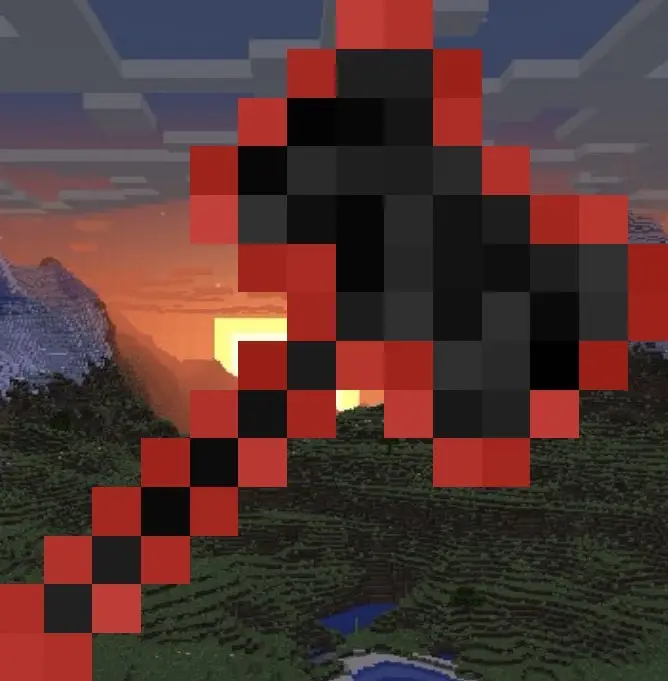 Pixelated red and black axe at sunset