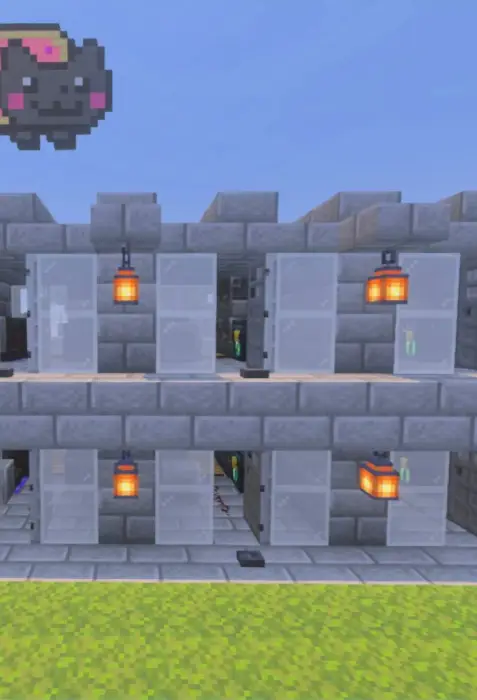 Multi-level stone building with lanterns
