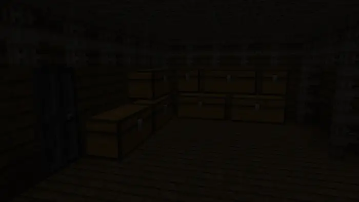 Dark wooden room with stacked storage chests
