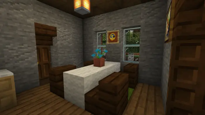Dining area with table, chairs, and decor.