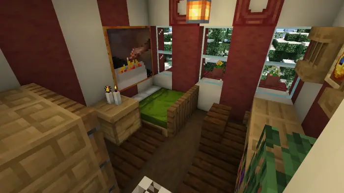 Cozy bedroom with green bed and candles