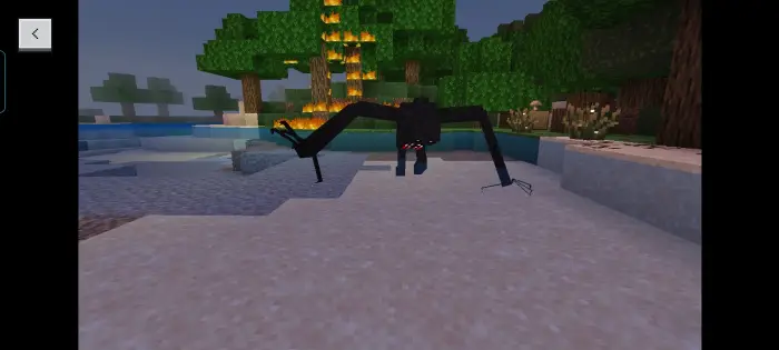 Creepy black creature with long arms on sand