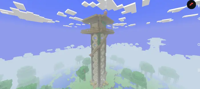 Tall eerie stone tower in a misty forest