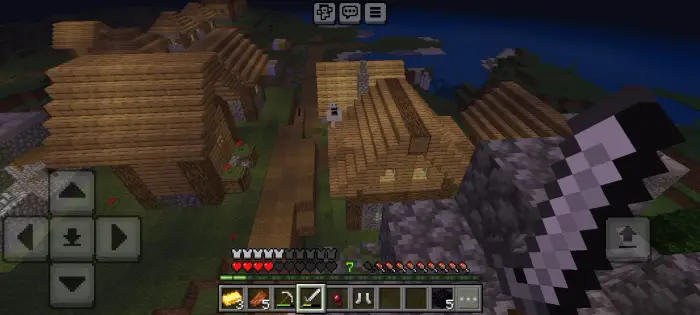 First-person view of a spooky village at night