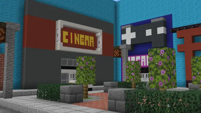 Cinema and arcade buildings in blocky plaza