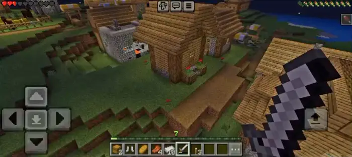 First-person view exploring a village at night