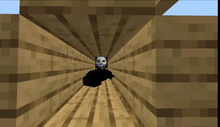 Hostile black entity with white face in tunnel