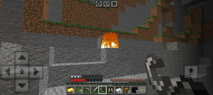 Cave scene with mysterious fire and UI icons