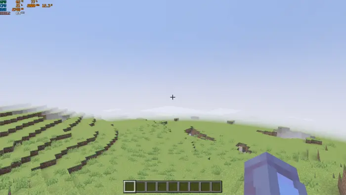 Wide grassy landscape with distant horizon.
