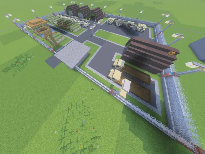Military base with vehicles and hangars
