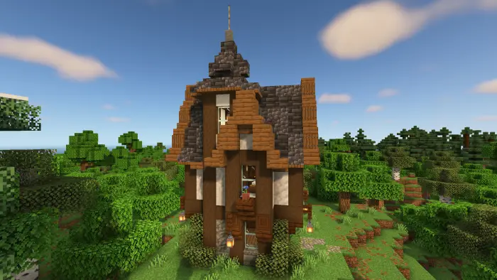 Medieval wooden house in a forest clearing
