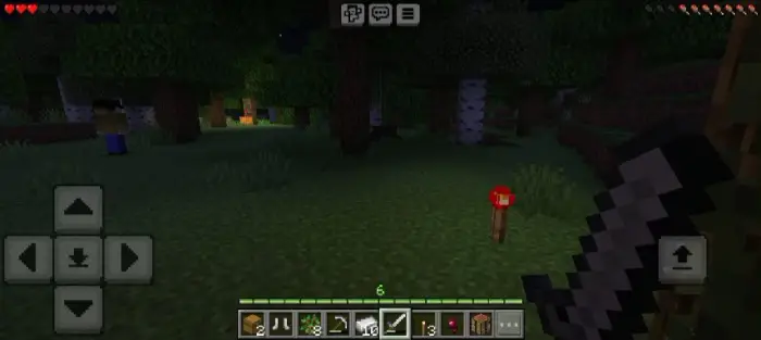 Player explores dark forest with eerie figure.