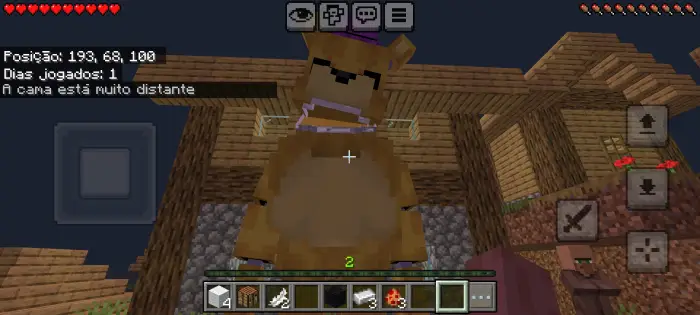 Large animatronic bear mob in a village.