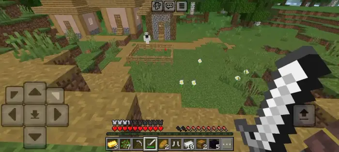 Player with sword near haunted village house