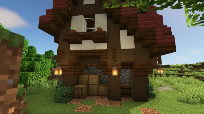 Cozy wooden cottage with lanterns outside