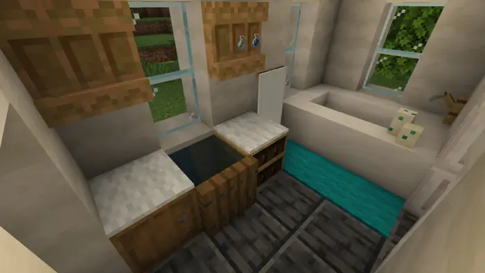 Modern villa bathroom with tub and sink.