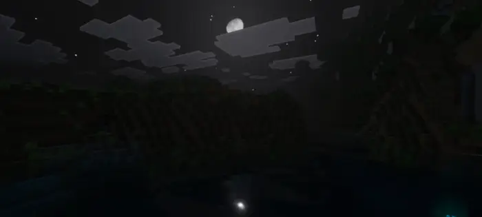 Moonlit sky with clouds and water reflections