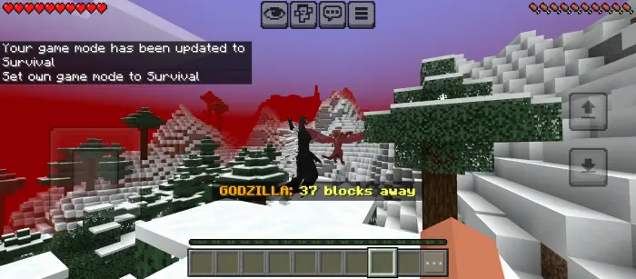 Giant monster approaches snowy mountains.