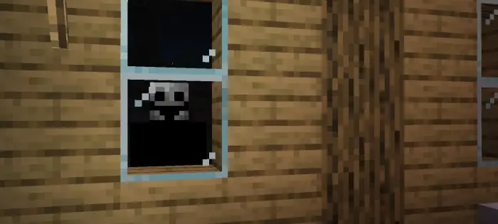 Spooky pixel figure peers through window at night