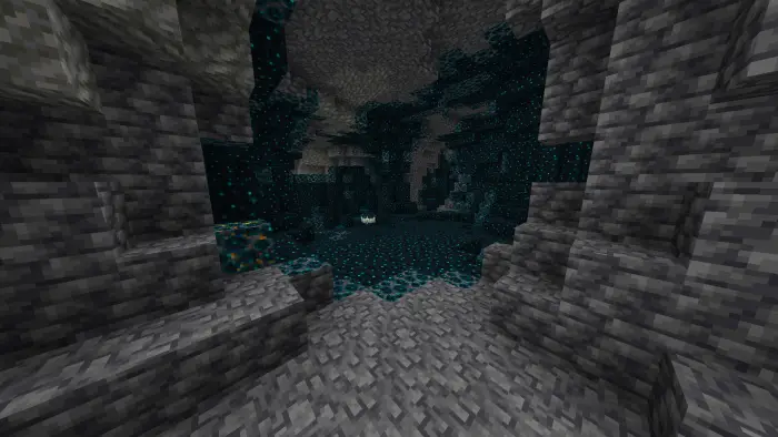 ALT Brightly lit underground cave with sculk.