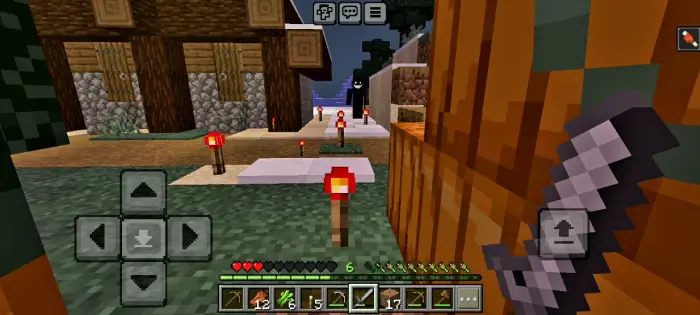 Shadowy figure lurks near village houses