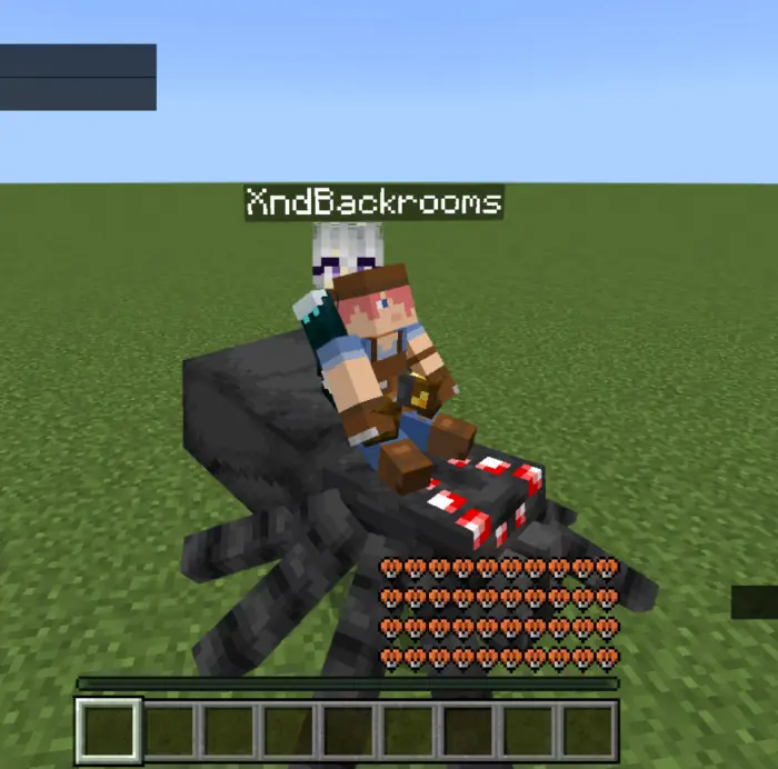 Player riding a giant spider in-game.
