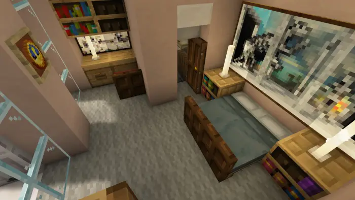 Cozy bedroom with art, bookshelves, and desk