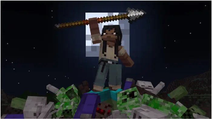 Player stands victorious over mobs at night