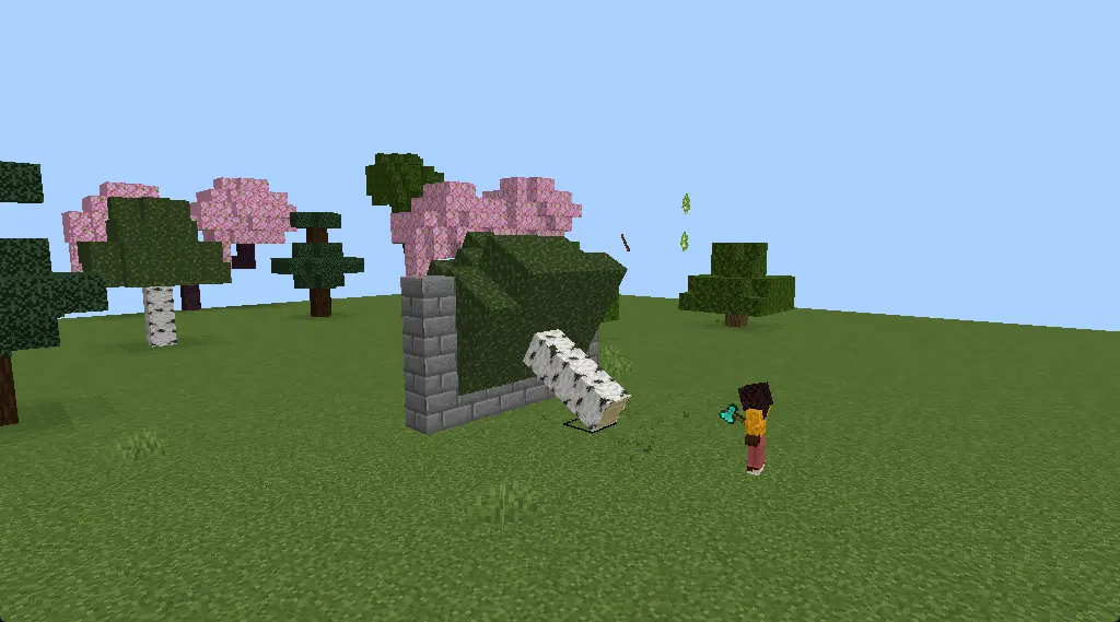 A birch tree stops against a wall in Minecraft Bedrock