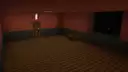 Dimly lit, eerie room with a shadowy figure