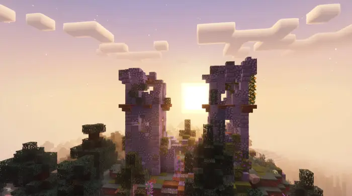 Golden-hour sunlight on ruined stone towers