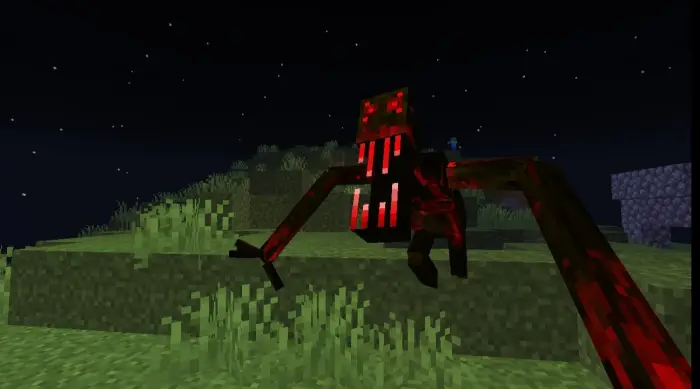 Red glowing spider-like mob at night