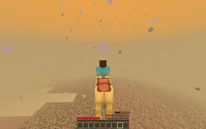 Player rides camel through a desert sandstorm.