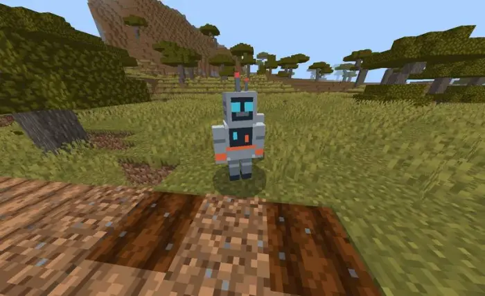 Robot standing on tilled farmland blocks
