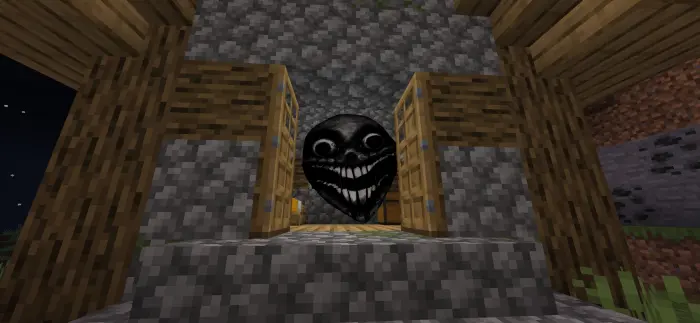 Terrifying face lurks inside a stone house