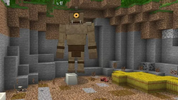 Cyclops boss standing in a rocky cave.