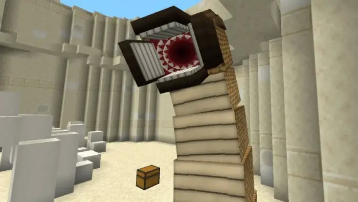 Giant sand worm boss near a treasure chest